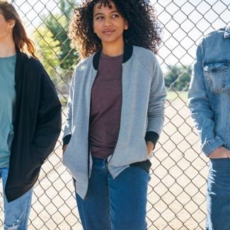 Line up of jackets with jersey bomber jacket from and center